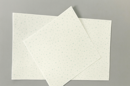 White Tissue with Teal Stars